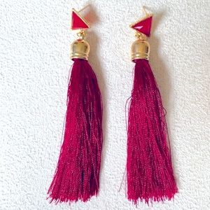 Red tassel statement earrings